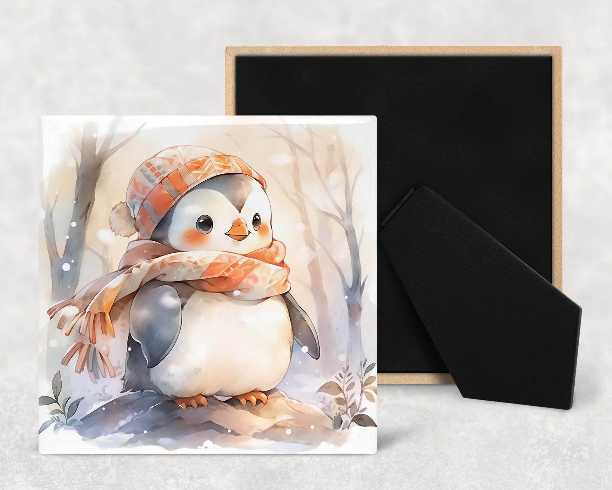 a card with a picture of a penguin wearing a hat and scarf