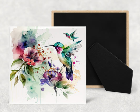 a card with a watercolor painting of a hummingbird and flowers