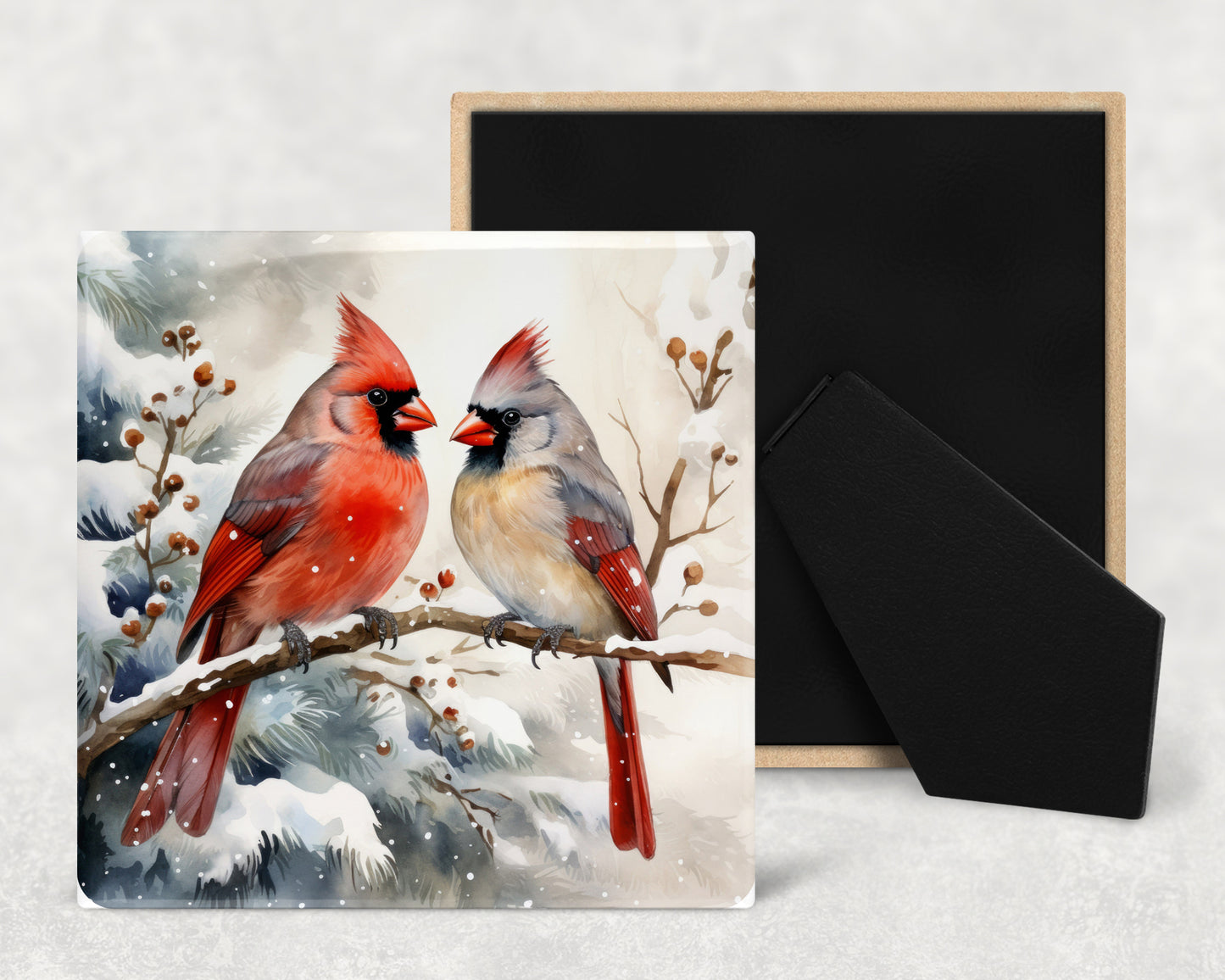 a couple of birds sitting on top of a tree branch